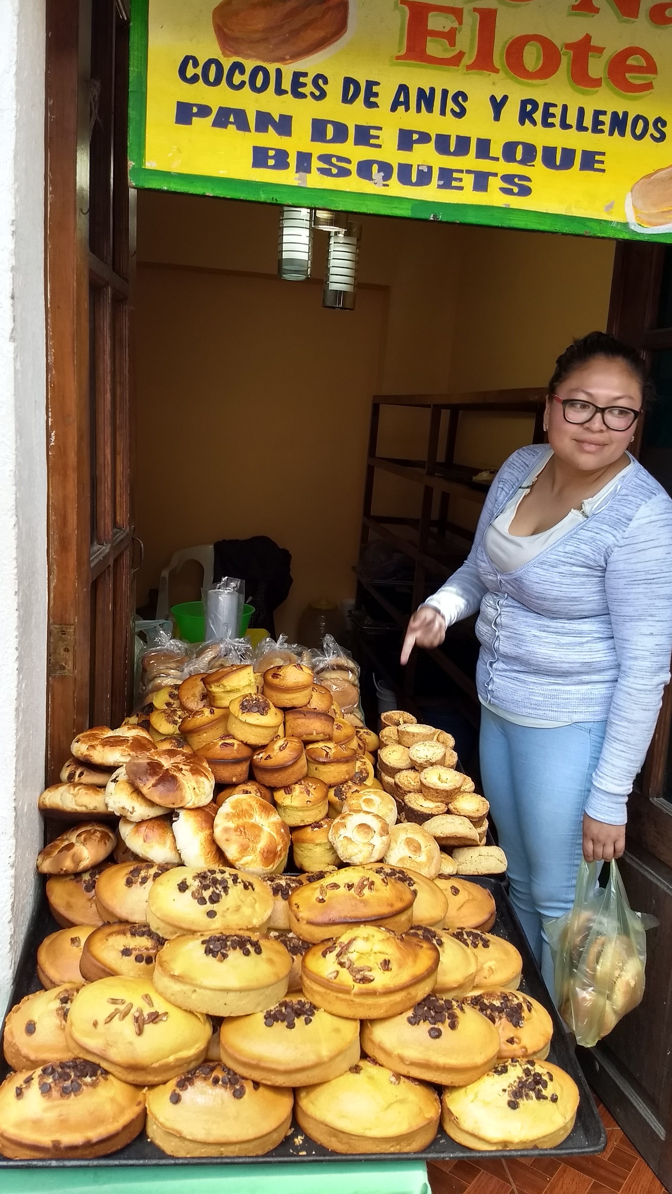 Vendor selling bread made with pulque