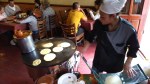 Making tortillas by hand in a restaurant.